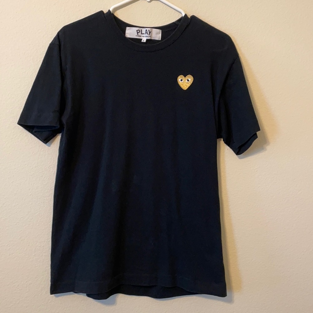 Large Comme des Garçons PLAY Golden heart shirt.